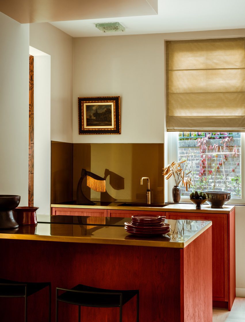 A red copper table lamp in the kitchen