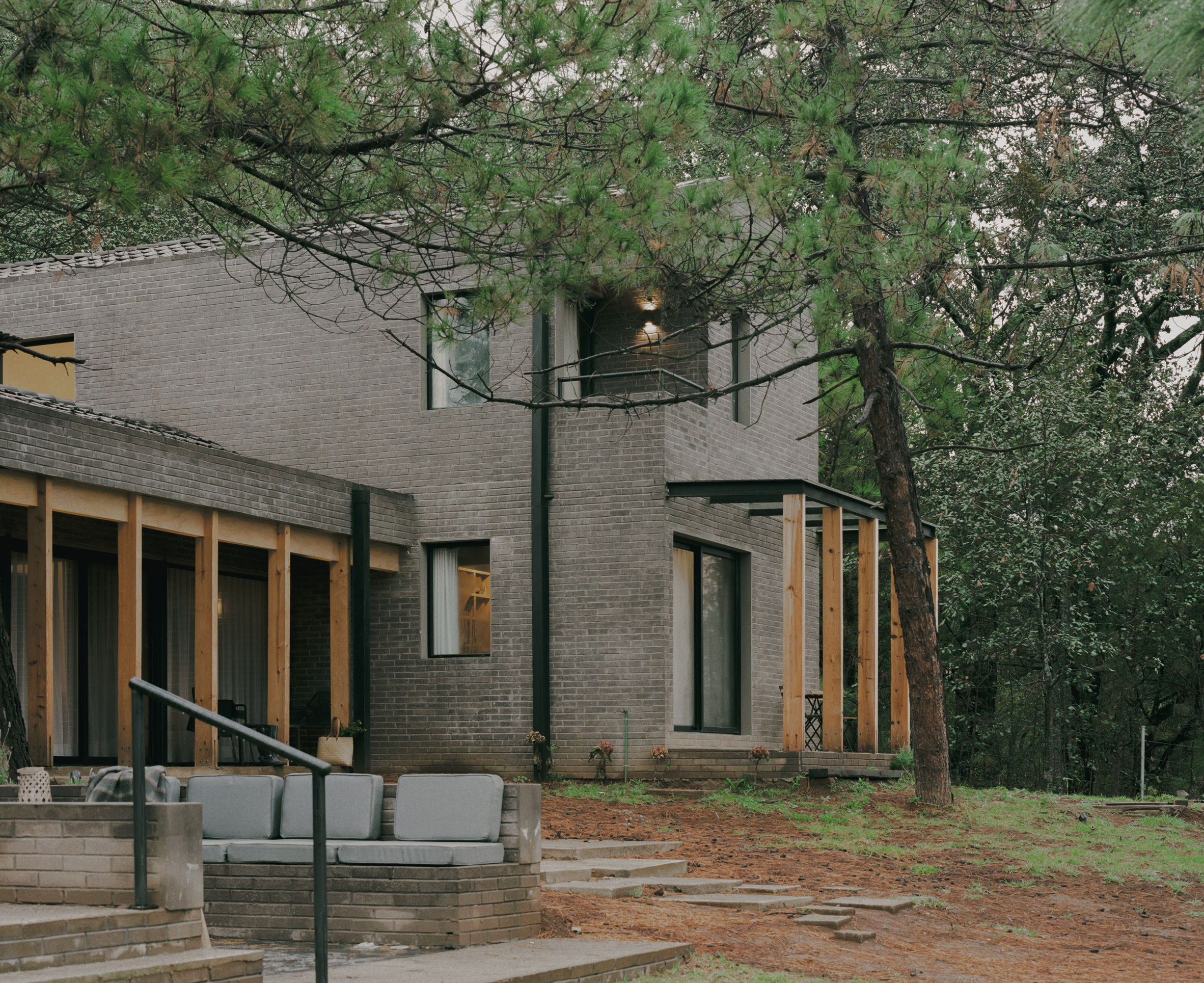 Grey brick-clad house