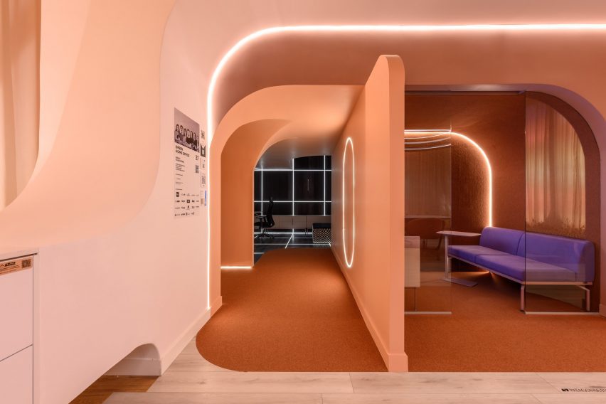 Desert-hued room with curved-edge surfaces and walls