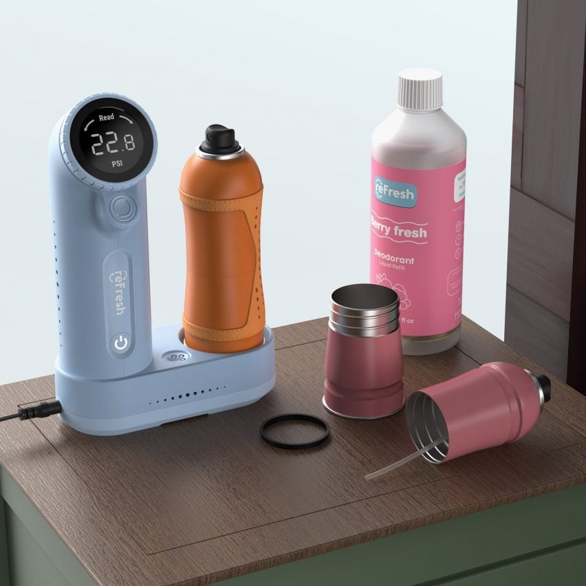 A visualisation of a blue electronic device and two aerosol cans in tones of orange and pink, with a pink bottle beside them, atop a brown surface.