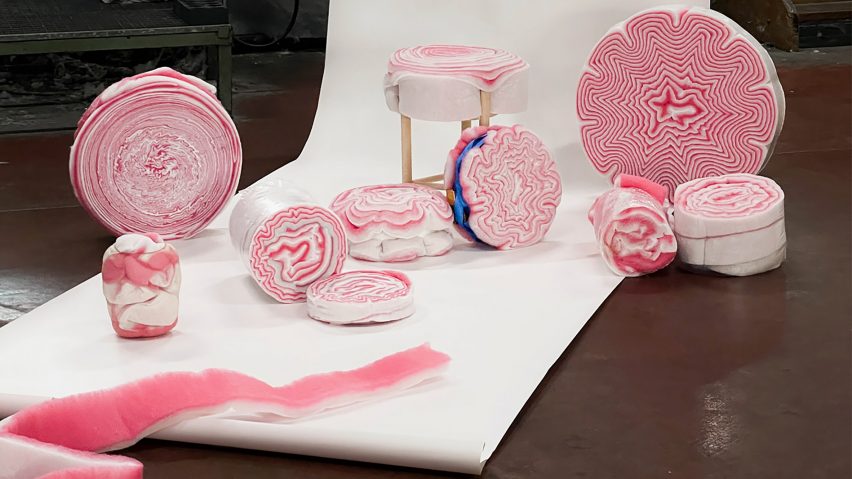 A collection of furniture objects wrapped in the same pink and white fleecing.