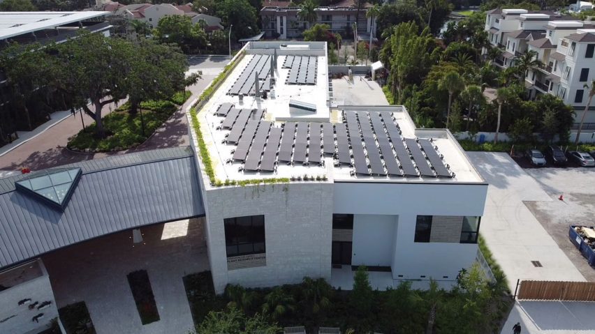 A parking lot with solar panels on top