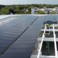 A roof with solar panels on top