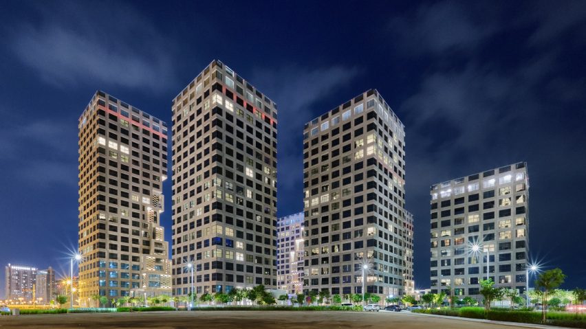 Pixel housing towers at night