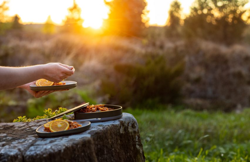 Food being served in the wild using a Savour meal prep kit by Amelia Cook from New Designers 2024