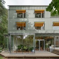 NOTO nestles green-timber duplex among trees in Hamburg