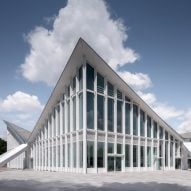 GMP Architekten renovates hyperbolic 1960s hall in Magdeburg
