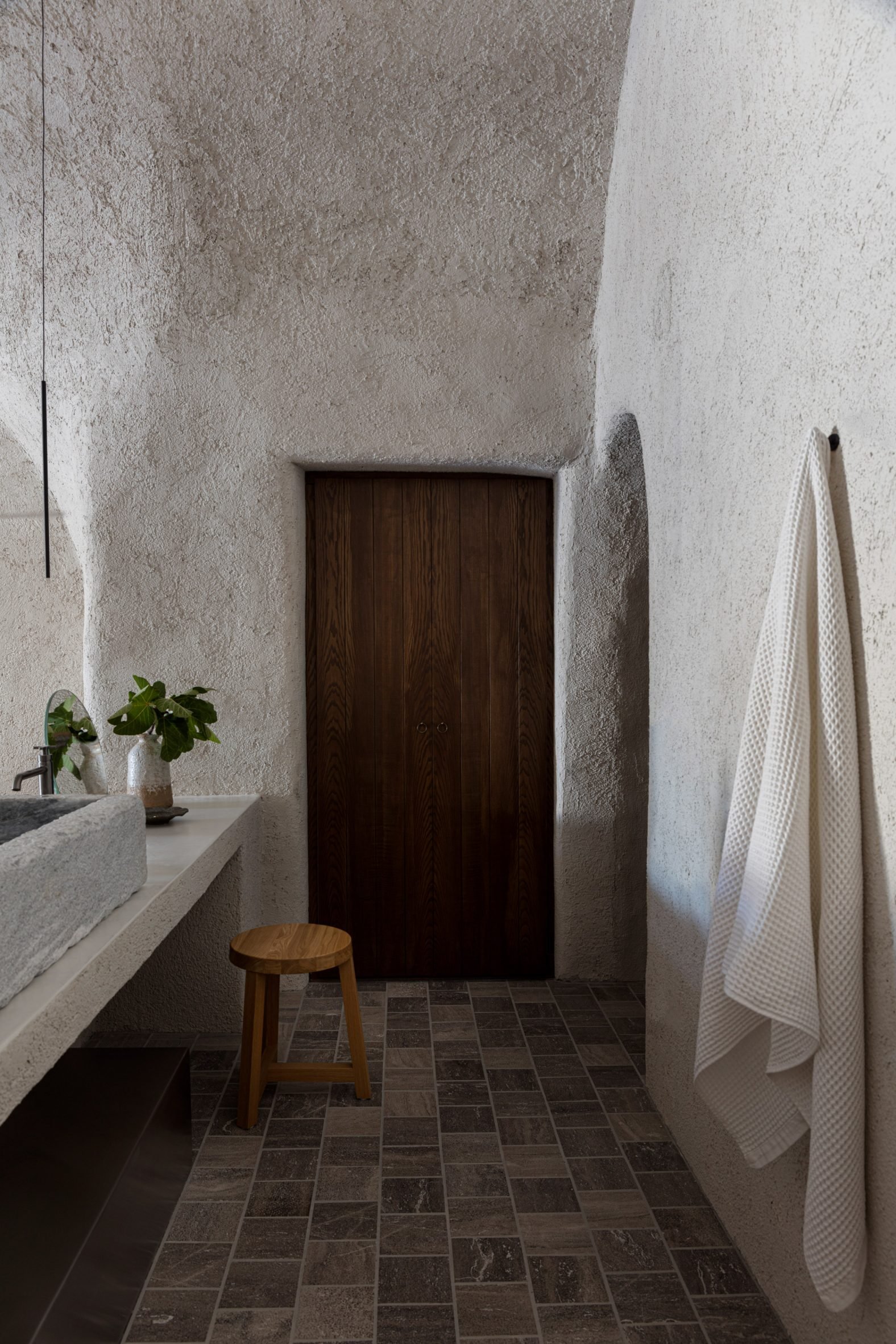 Bathroom interior within holiday home by Kapsimalis Architects