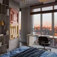 Bedroom with concrete pillar and desk with views over Kyiv