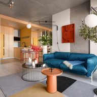 Open plan living space and kitchen in Suprematism apartment