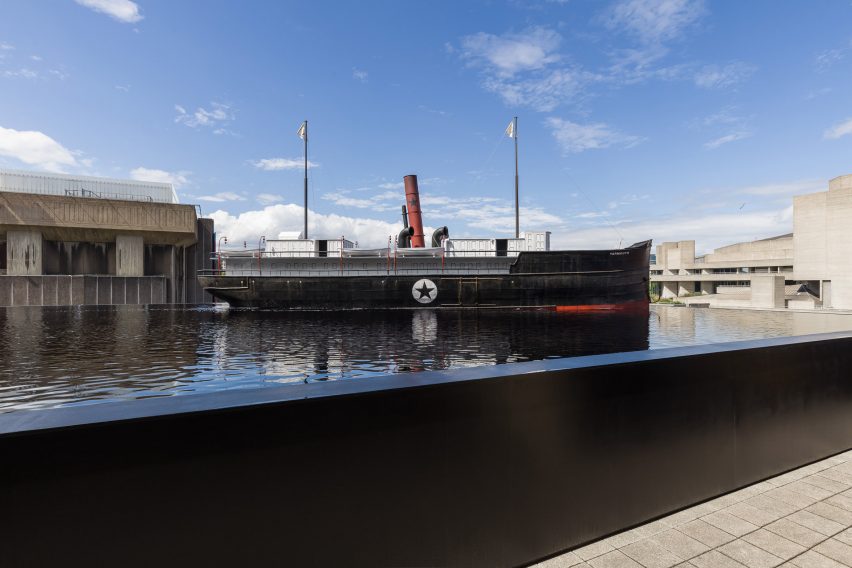 Sculptural boat on a rooftop pond