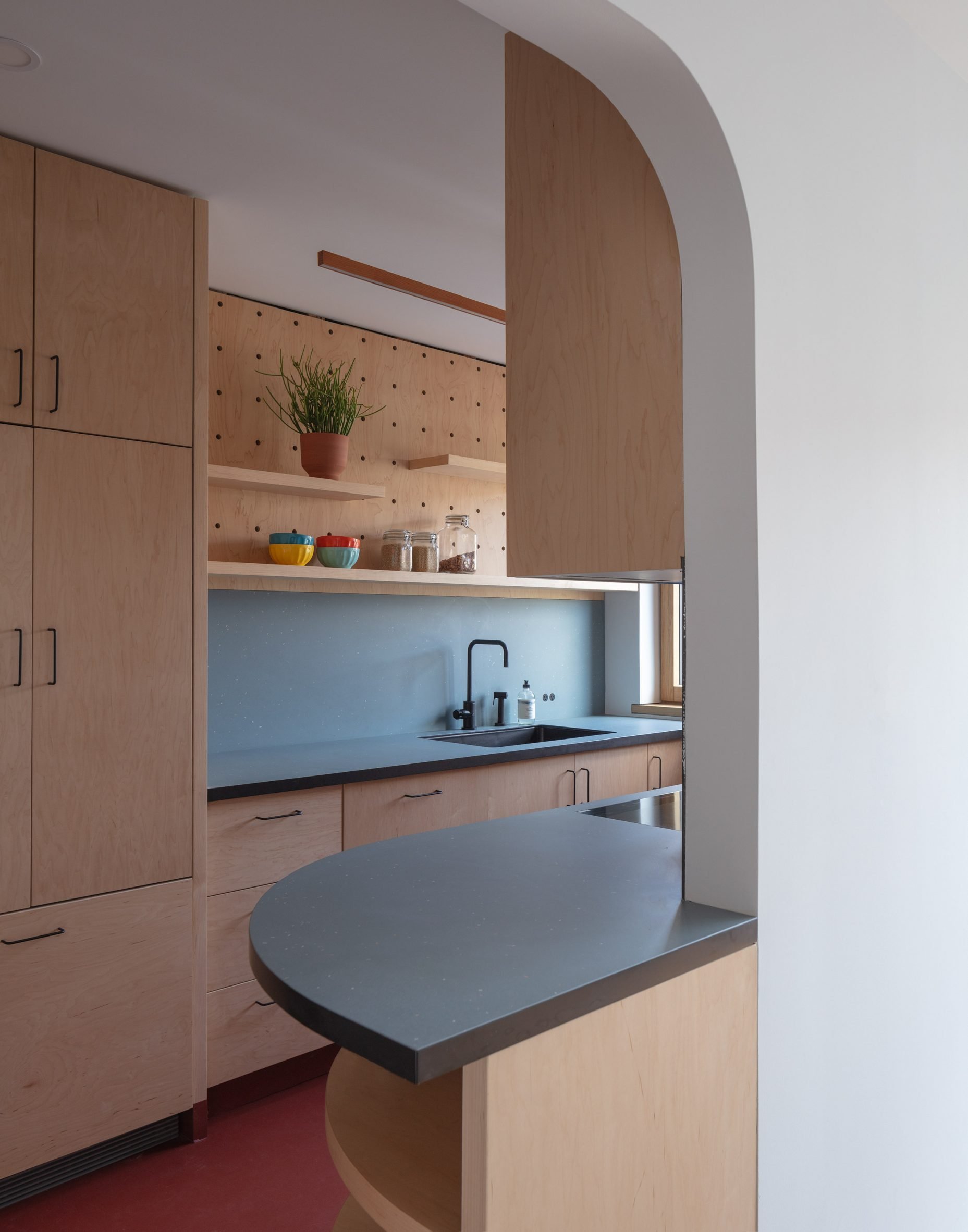 Kitchen with maple-faced plywood millwork