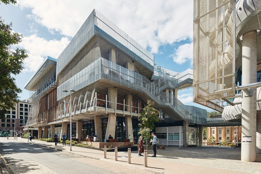 Exterior view of concrete student campus by KoningEizenberg