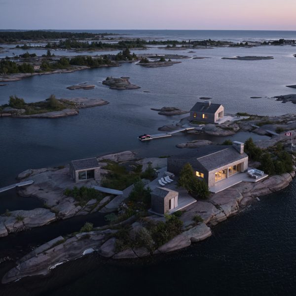 Cedar cottages by Akb Architects are “surrounded by open waters and expansive sky”