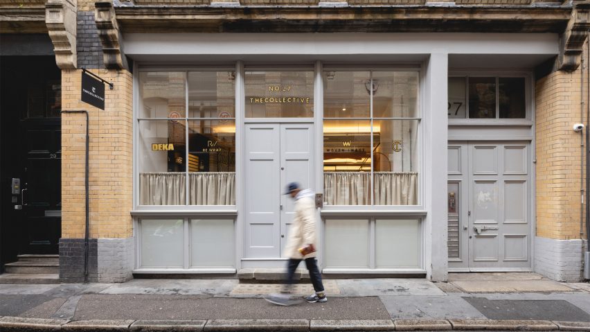 Photo of person walking passed the Collective showroom