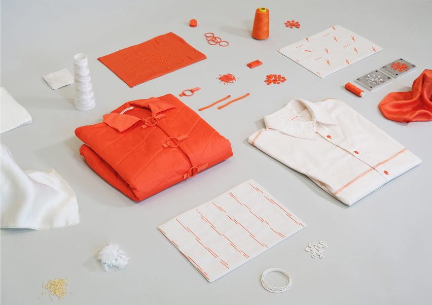 A photograph of a series of objects including yarn and shirts in tones of orange and white against a grey background.