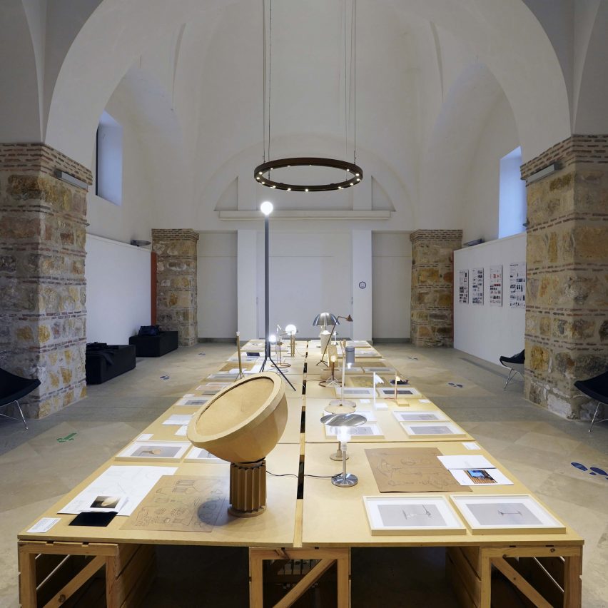 A classroom with work displayed on a centre table.