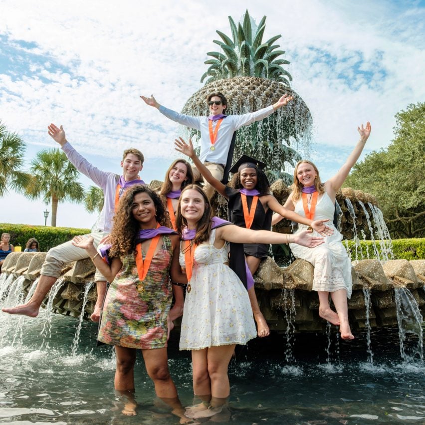 Clemson University graduates celebrating.