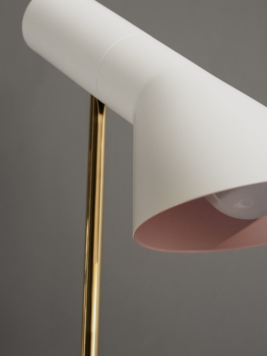 Close up image of a Louis Poulsen mini lamp with pink interior