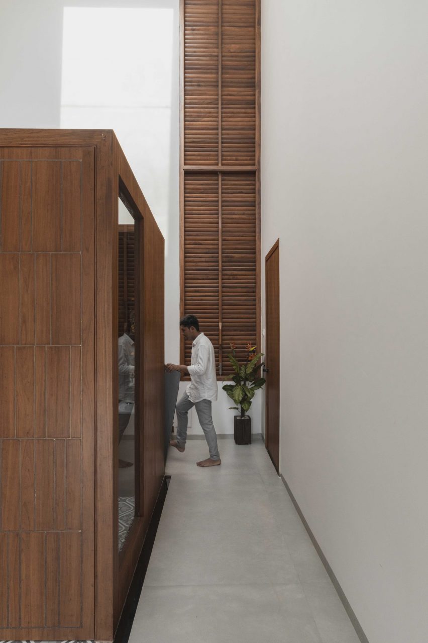 Corridor within A House in the Farm by Studio MOB