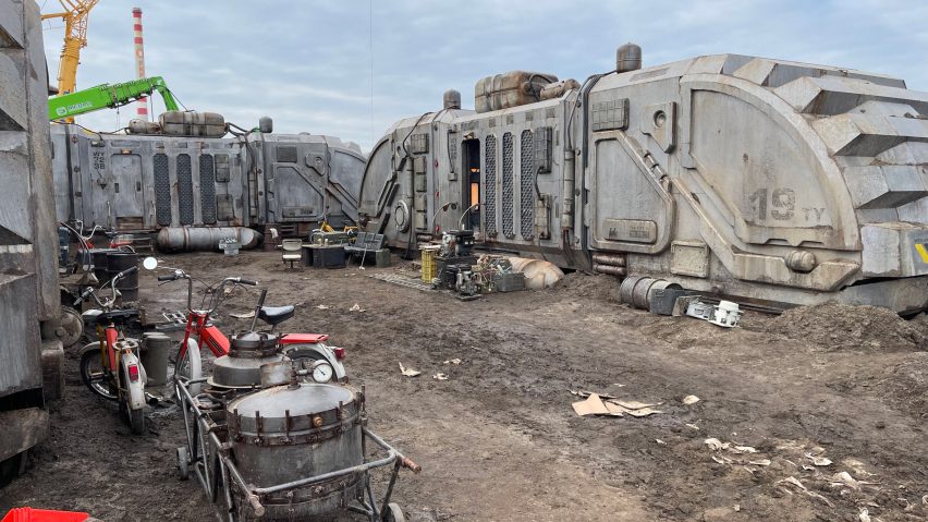 Behind-the-scenes photo of Jackson's Star mining colony trailers