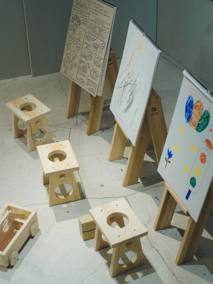 Stools in front of three easels