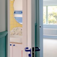 Bathroom with pink and yellow tiles