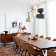 Wood table with hanging lamps