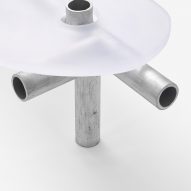 Metal and plastic item of furniture on white backdrop