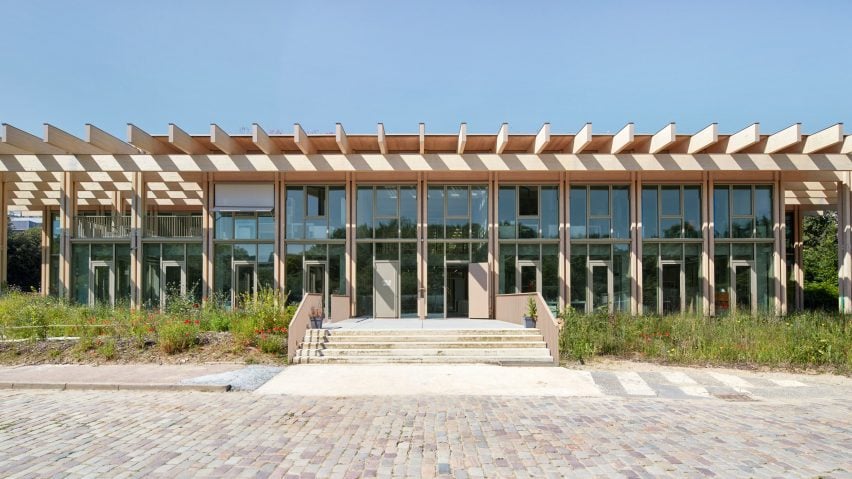 Exterior view of timber office building by Atelier du Pont