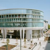 Atelier O-S perches "Roman circus" car park in France on concrete columns