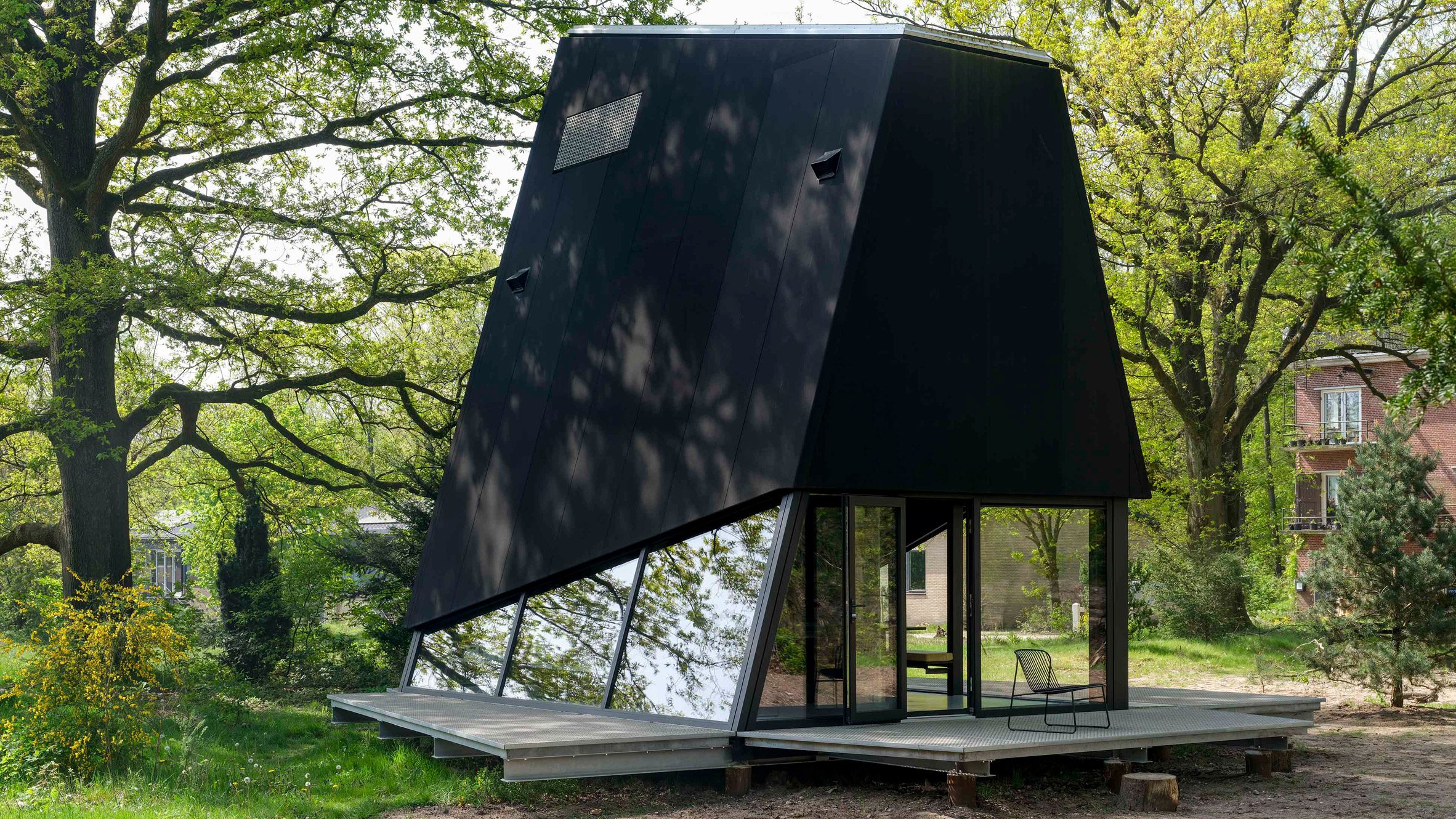 https://static.dezeen.com/uploads/2024/08/hero-stay-under-the-radar-retreat-sander-van-schaik_dezeen_2364_col_0.jpg