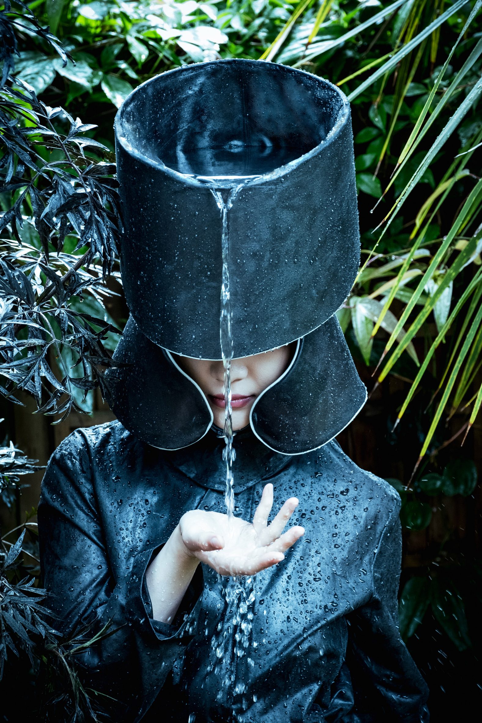 Rain-harvesting hats designed by Mijoda Dajomi