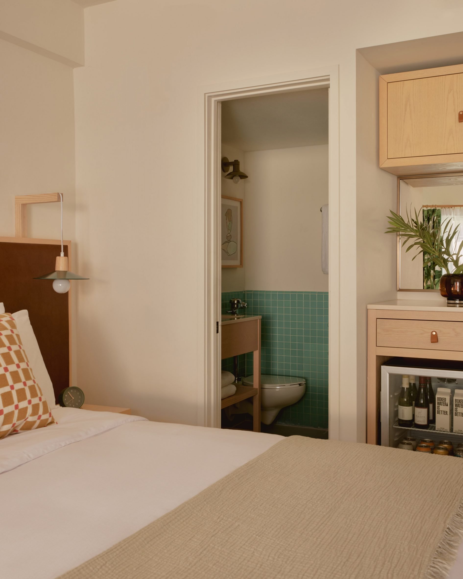 En-suite bathroom view of Hotel Lucine guest room by Kartwheel Studio