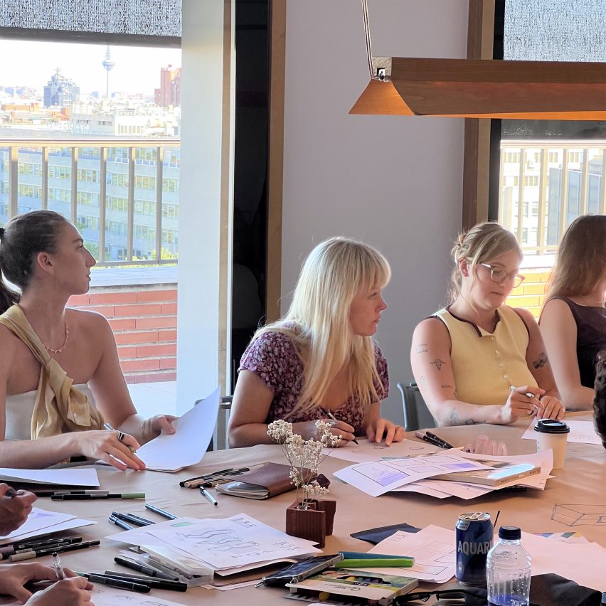 an image of students working together