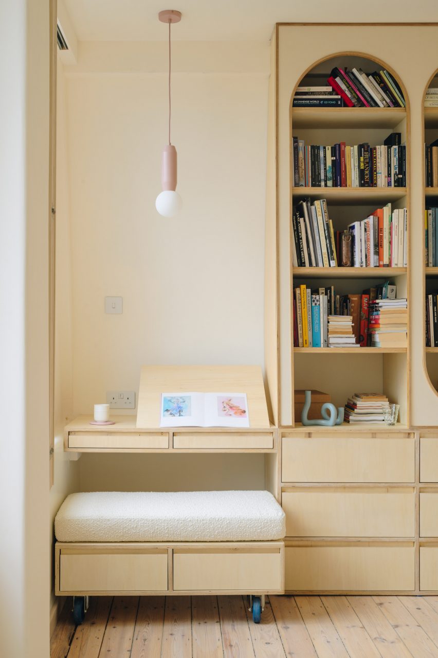 View of flat interior with bulb above study area