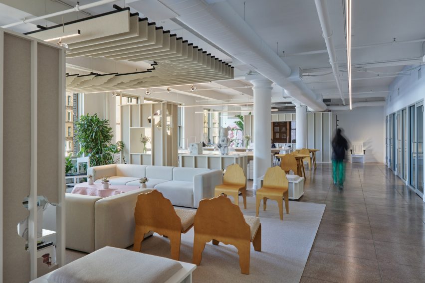 Industrial style space with acoustic panels above a lounge area