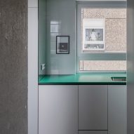 Kitchen with green worktop