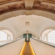 Arched mezzanine leading to rooms