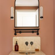 Washbasin made from Portuguese stone and arched mirror