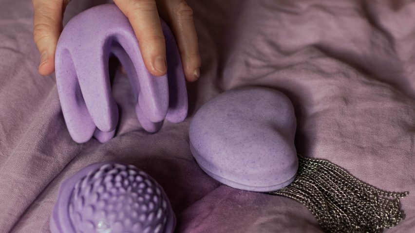 Purple sex toys on a sheet