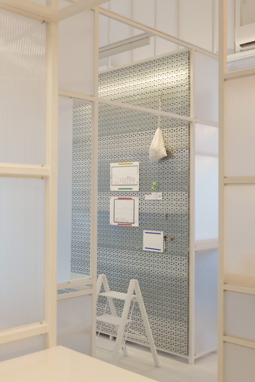 Wall clad with cable trays in Workshop office interior in Singapore