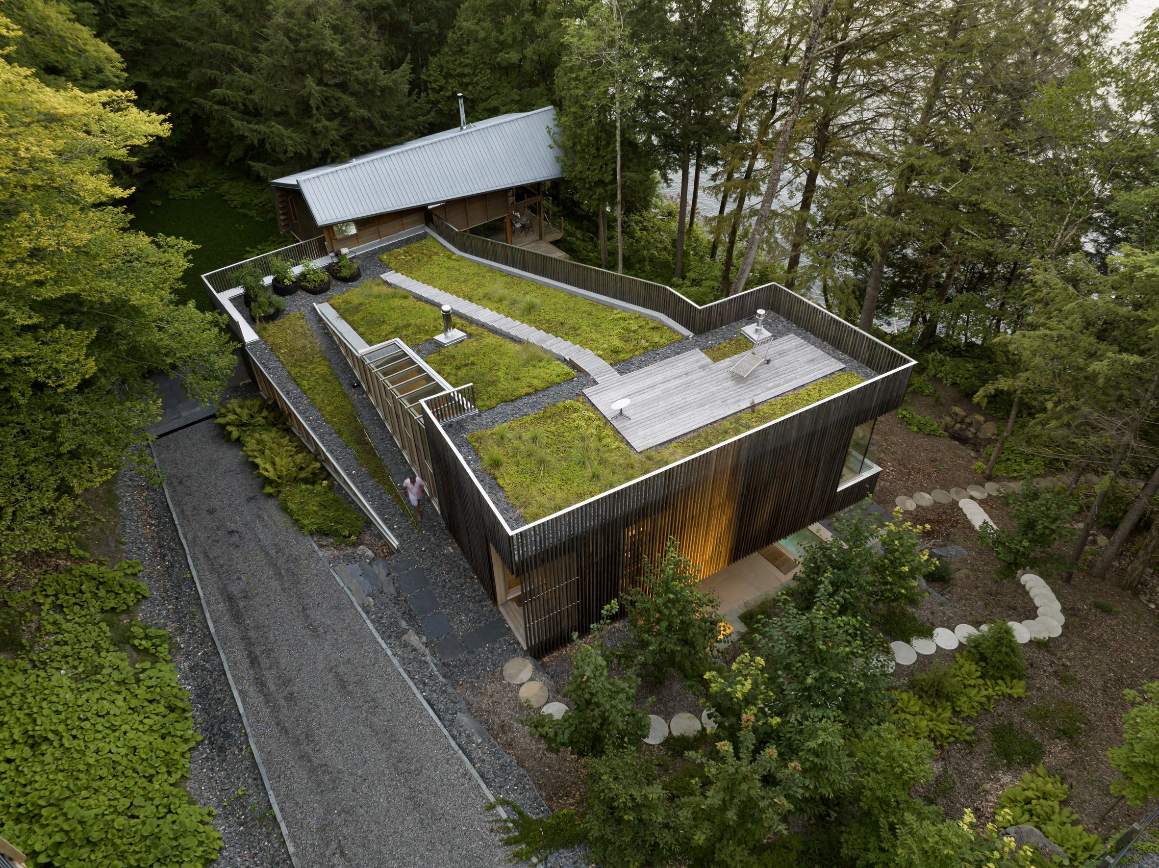 Wooden home with green roof in canada