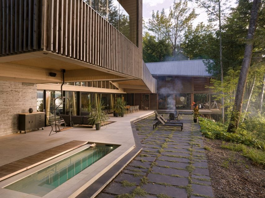 Pool and pation on wooden Quebec house