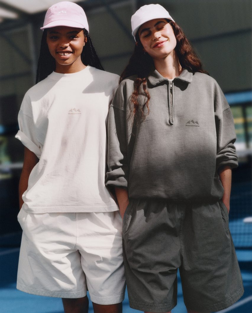 Models wearing grey and white tennis wear