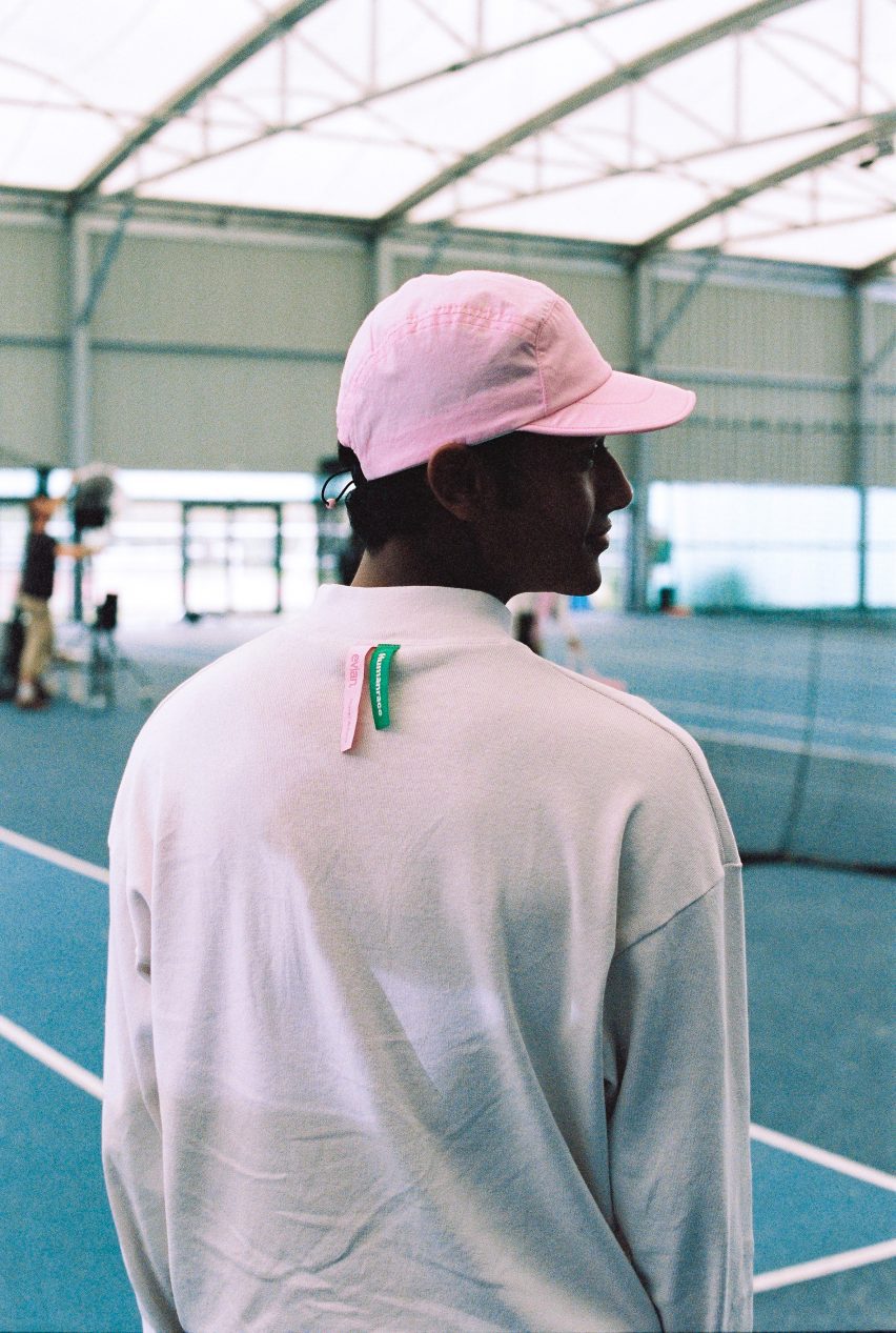 Model in pink hat by Humanrace and Evian