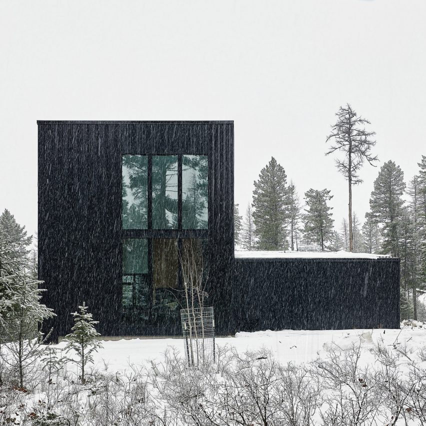 Black house in the snow