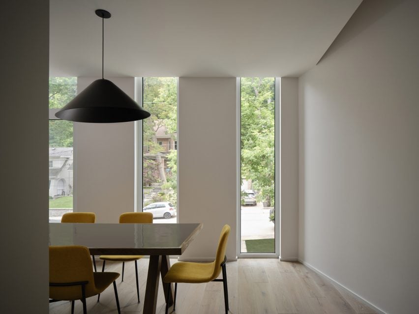 Dining room with black shade light