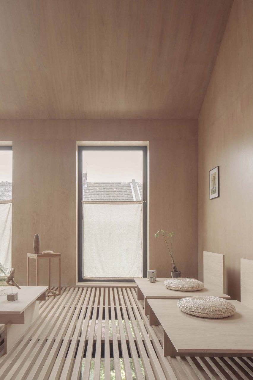 Sunroom with perforated floor within Cooper House