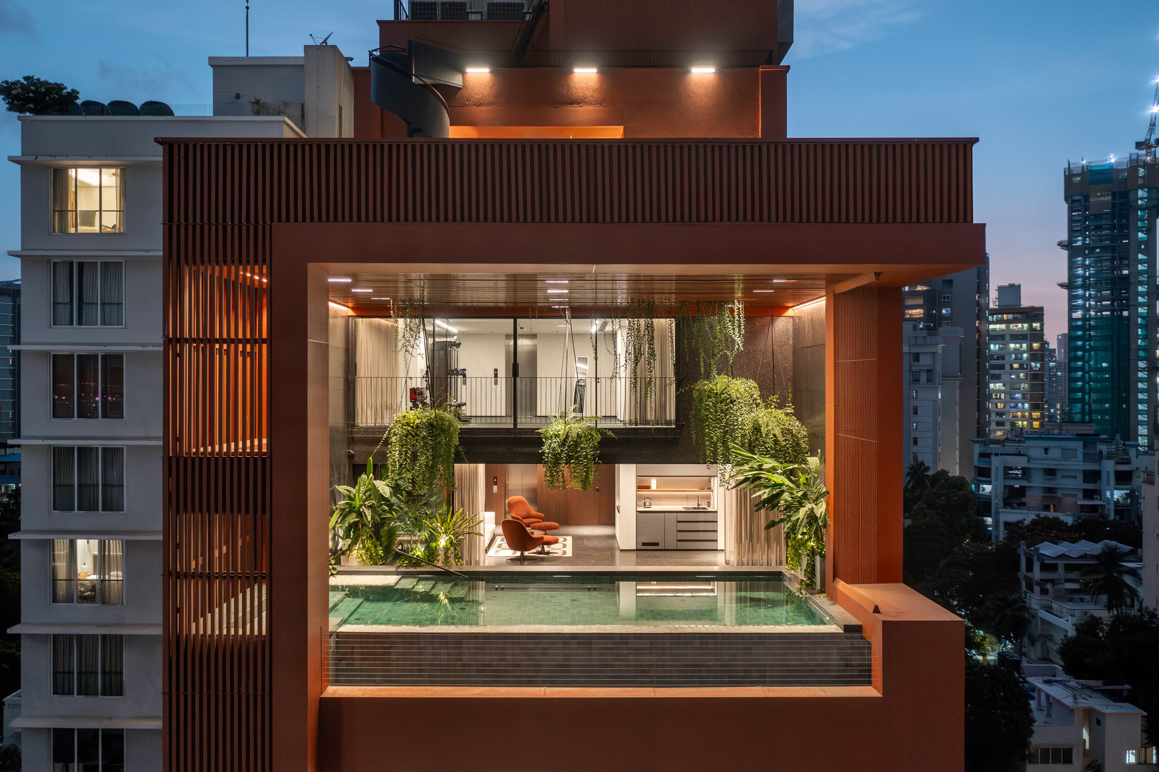 View of upper floor terraces at family home by SPASM Design